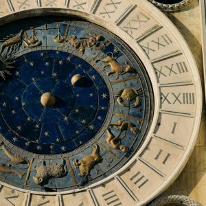 A close-up of the Zodiac signs on the iconic St Mark's Clocktower in Venice, Italy.